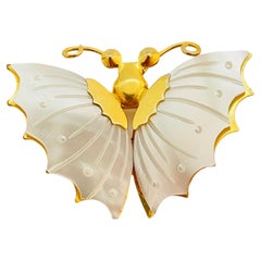 Vintage gold tone mother of pearl butterfly brooch