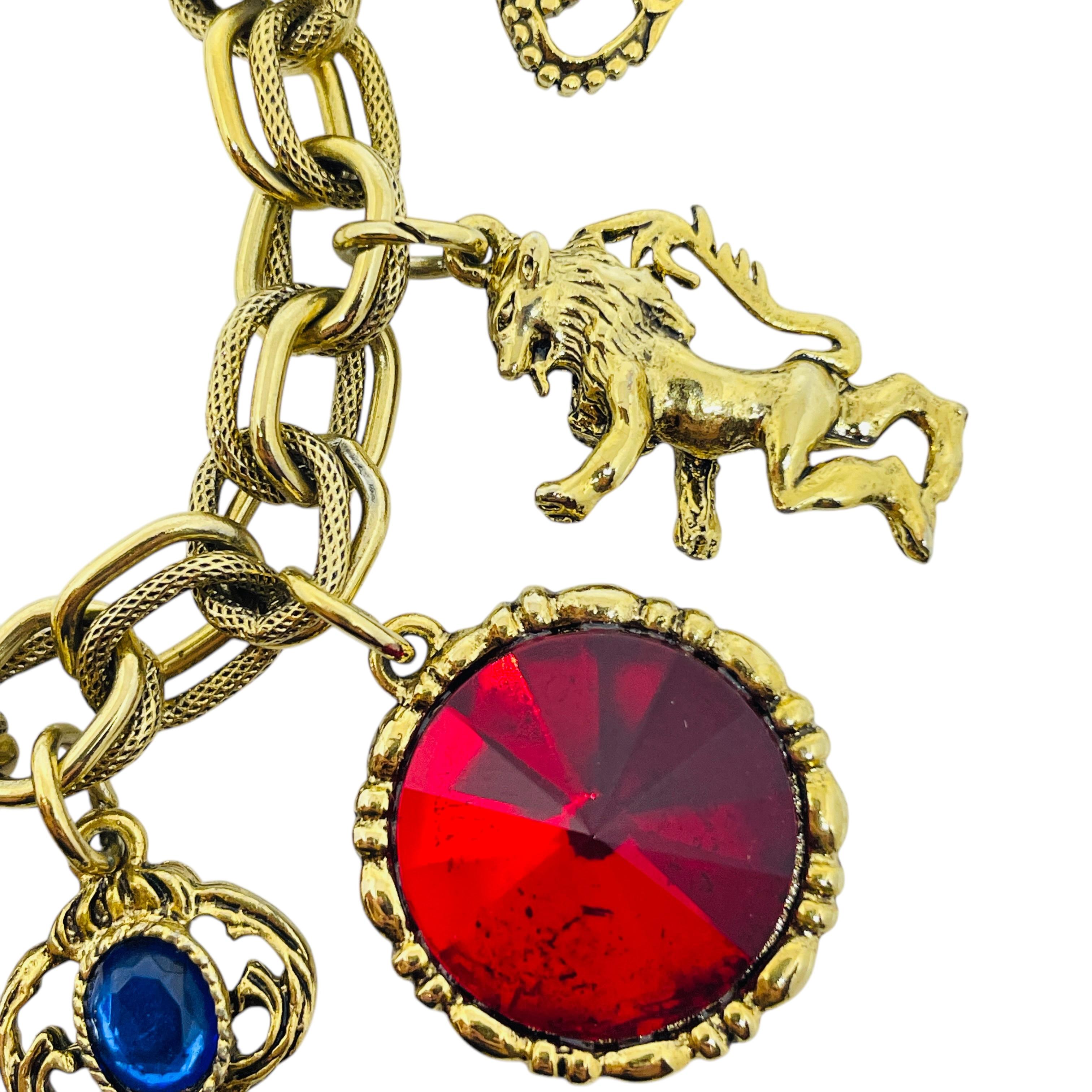 Bracciale in vetro a catena con charme multiplo vintage con chiave di leone In condizioni buone in vendita a Palos Hills, IL