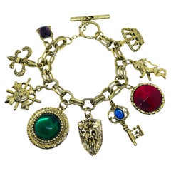 Vintage gold tone multi charm chain glass bracelet lion key