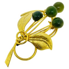 Vintage gold tone natural green jade flower designer brooch