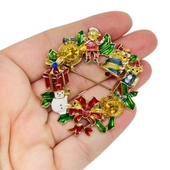 Vintage gold tone NRT signed Christmas wreath enamel rhinestone designer brooch