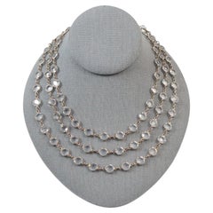Collar largo Sautoir vintage de cristal con espalda abierta en tono dorado, 54", circa años 70