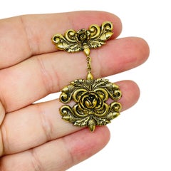 Vintage gold tone ornate flower dangle designer brooch