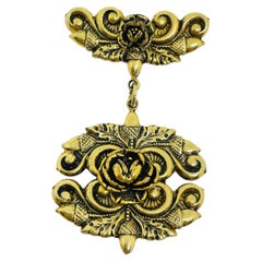 Vintage gold tone ornate flower dangle designer brooch