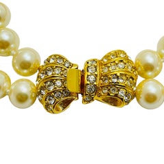 Vintage gold tone pearl bow crystsl designer bracelet