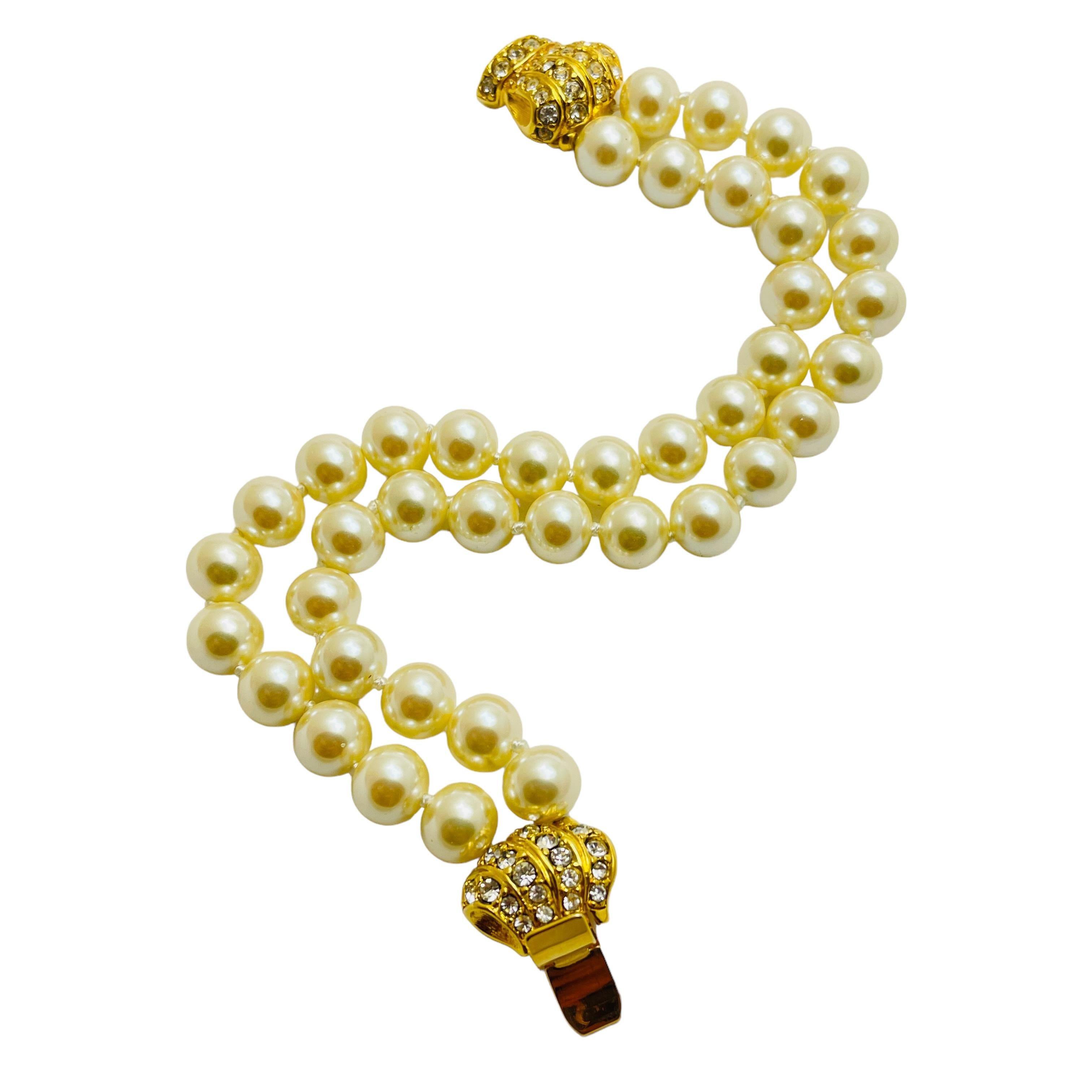 Women's Vintage gold tone pearl bow crystsl designer bracelet For Sale