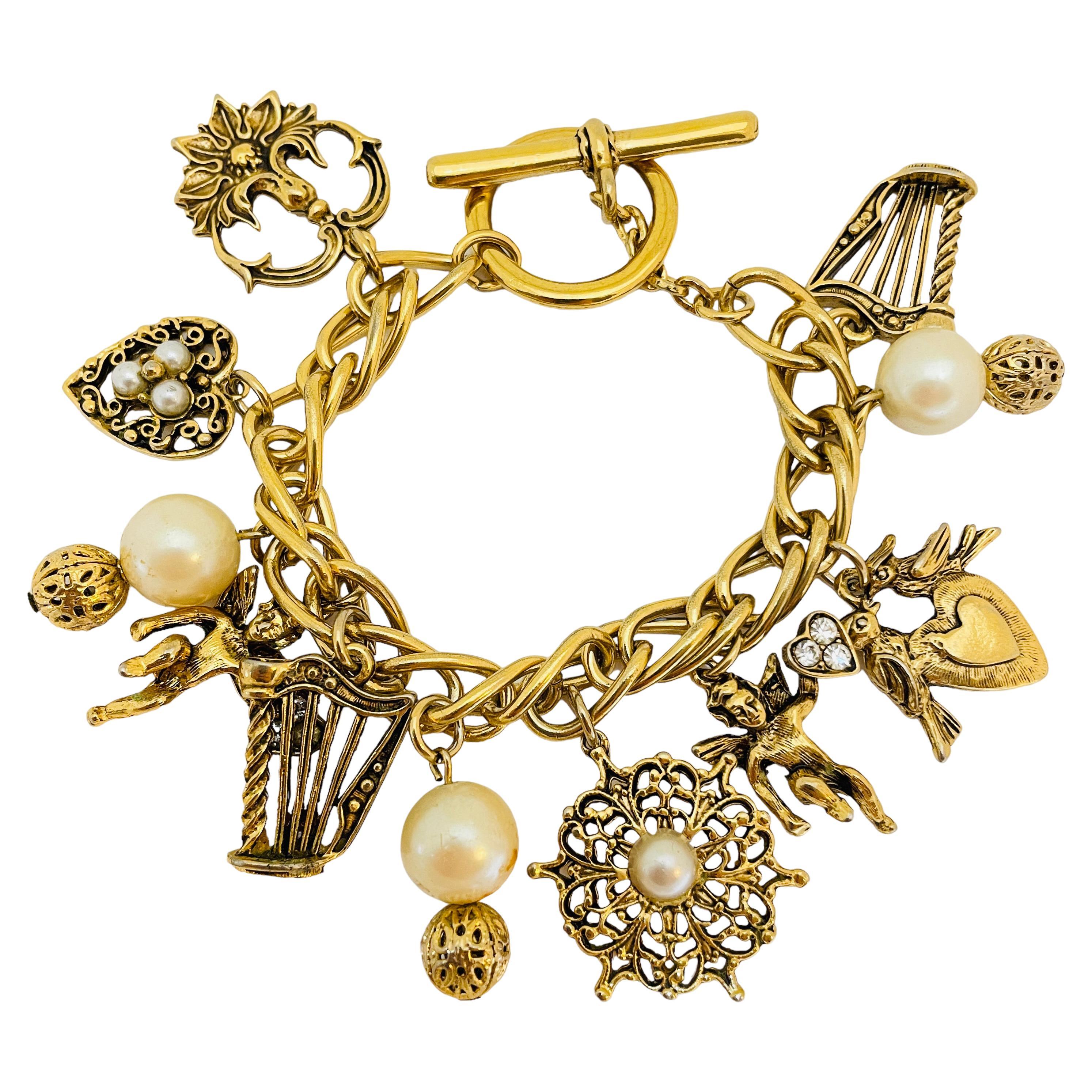 Vintage gold tone pearl charm chain link bracelet For Sale