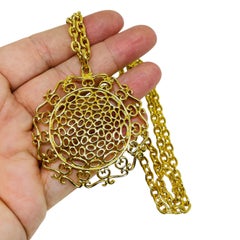 Collier vintage avec pendentif en or et chaîne de créateur