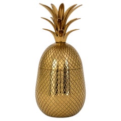 Caja decorativa vintage con forma de piña en tono dorado y acabado texturizado