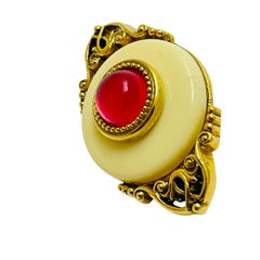 Vintage gold tone pink cream lucite designer brooch