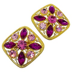 Vintage gold tone pink rhinestones massive designer clip earrings