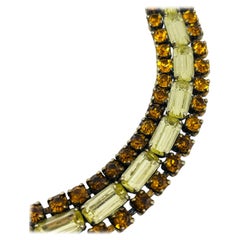 Vintage gold tone prong set rhinestone designer bracelet