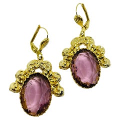 Vintage gold tone purple glass designer dangle earrings