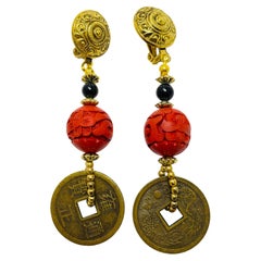 Vintage gold tone red cinnabar coin dangle clip on earrings
