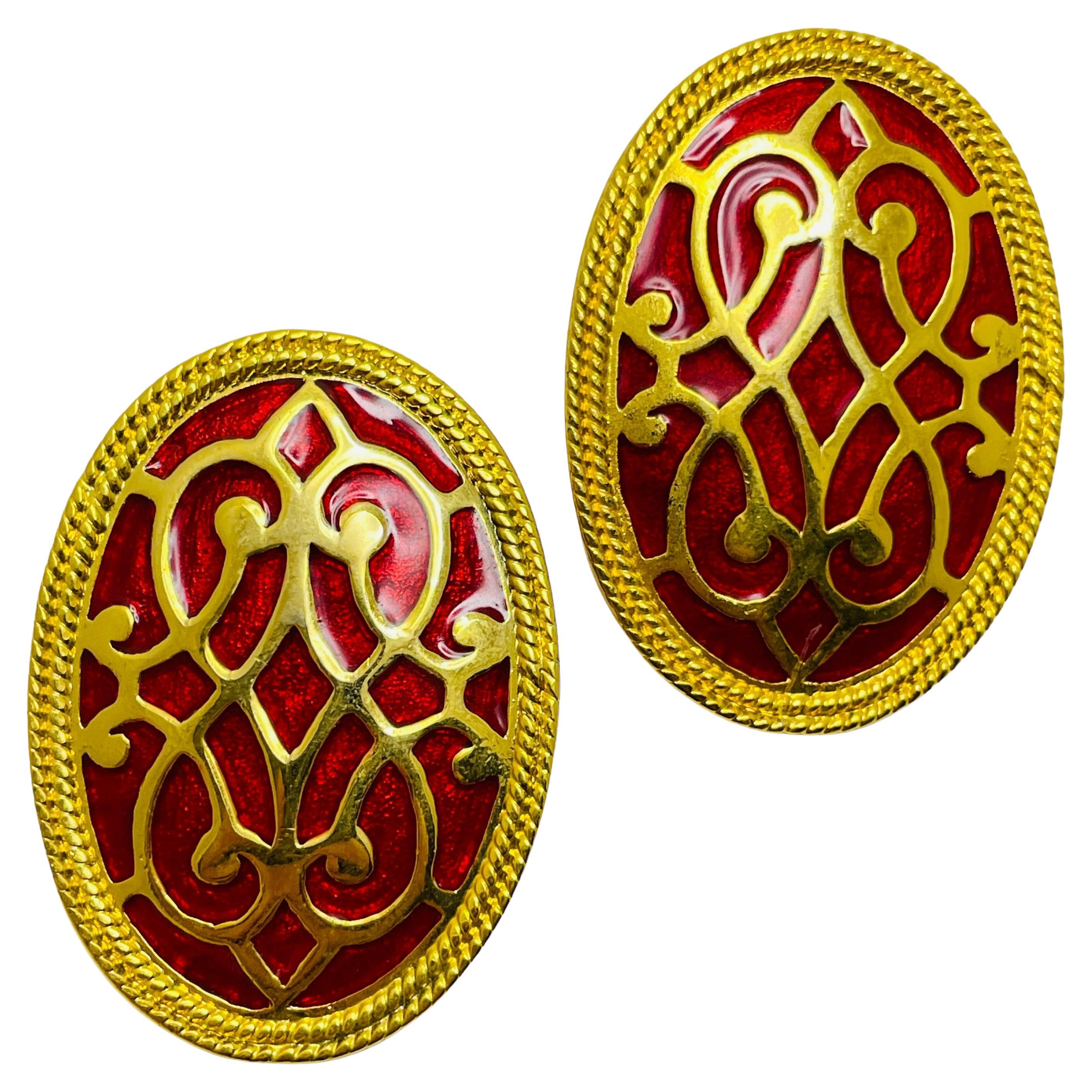 Vintage gold tone red enamel designer clip on earrings For Sale