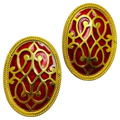 Vintage gold tone red enamel designer clip on earrings