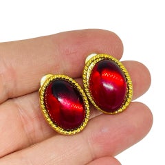 Vintage gold tone red glass designer clip on earrings