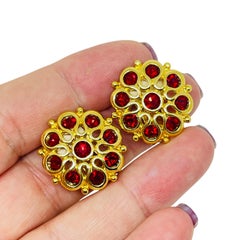 Vintage gold tone red rhinestones designer clip on earrings