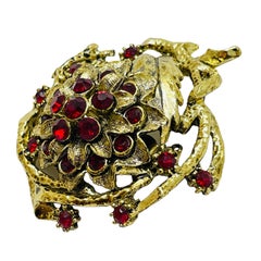 Vintage gold tone red rhinestones flower designer brooch