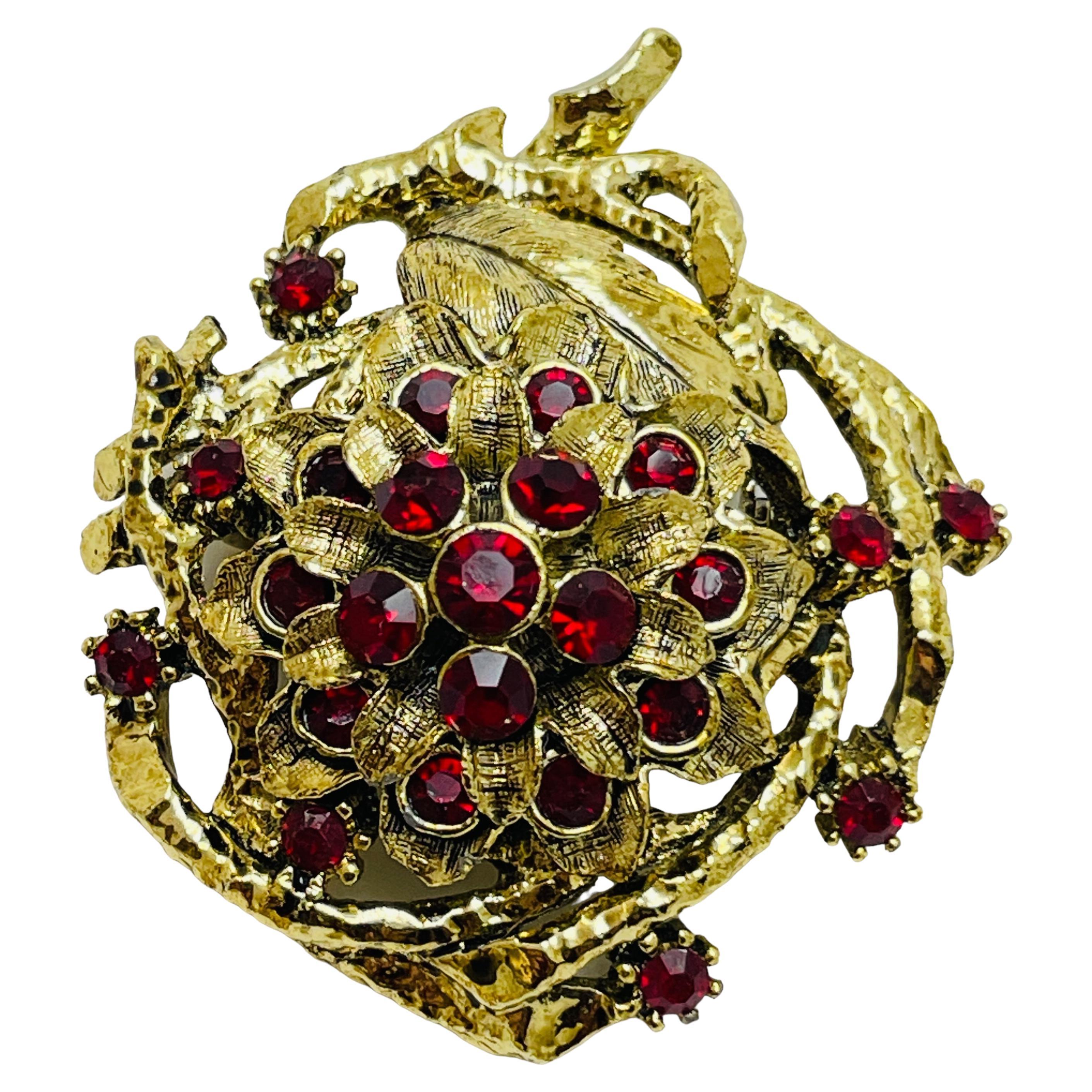 Vintage gold tone red rhinestones flower designer brooch