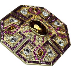 Broche octogonal vintage de cristal y brillantes dorados