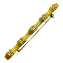 Vintage gold tone rhinestone bamboo designer brooch