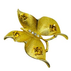 Vintage gold tone rhinestone butterfly designer brooch