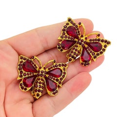 Vintage gold tone rhinestone butterfly designer clip on earrings