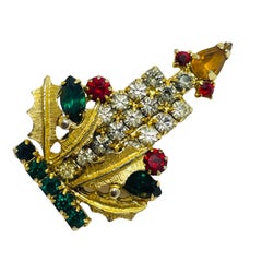 Vintage gold tone rhinestone Christmas candle brooch