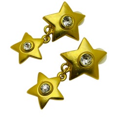 Vintage gold tone rhinestone dangle stars clip on earrings