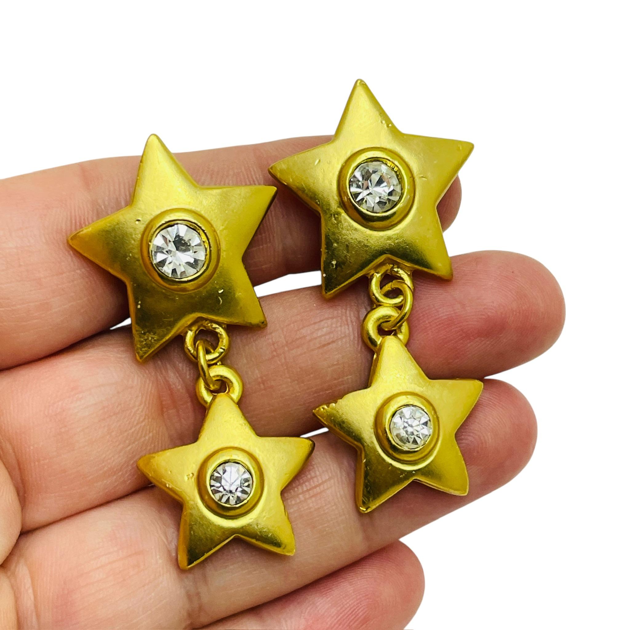 Women's Vintage gold tone rhinestone dangle stars clip on earrings For Sale