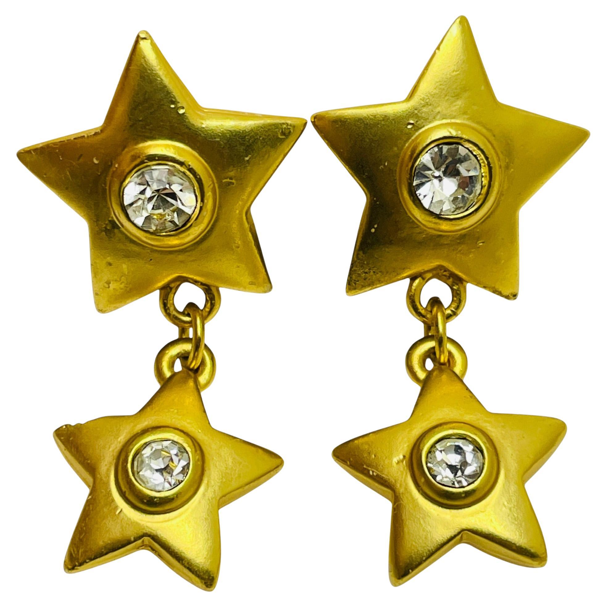 Vintage gold tone rhinestone dangle stars clip on earrings For Sale