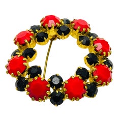 Vintage gold tone rhinestone designer brooch