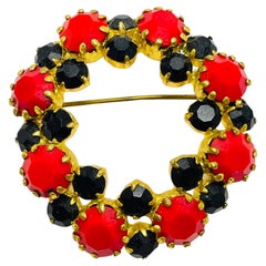 Vintage gold tone rhinestone designer brooch