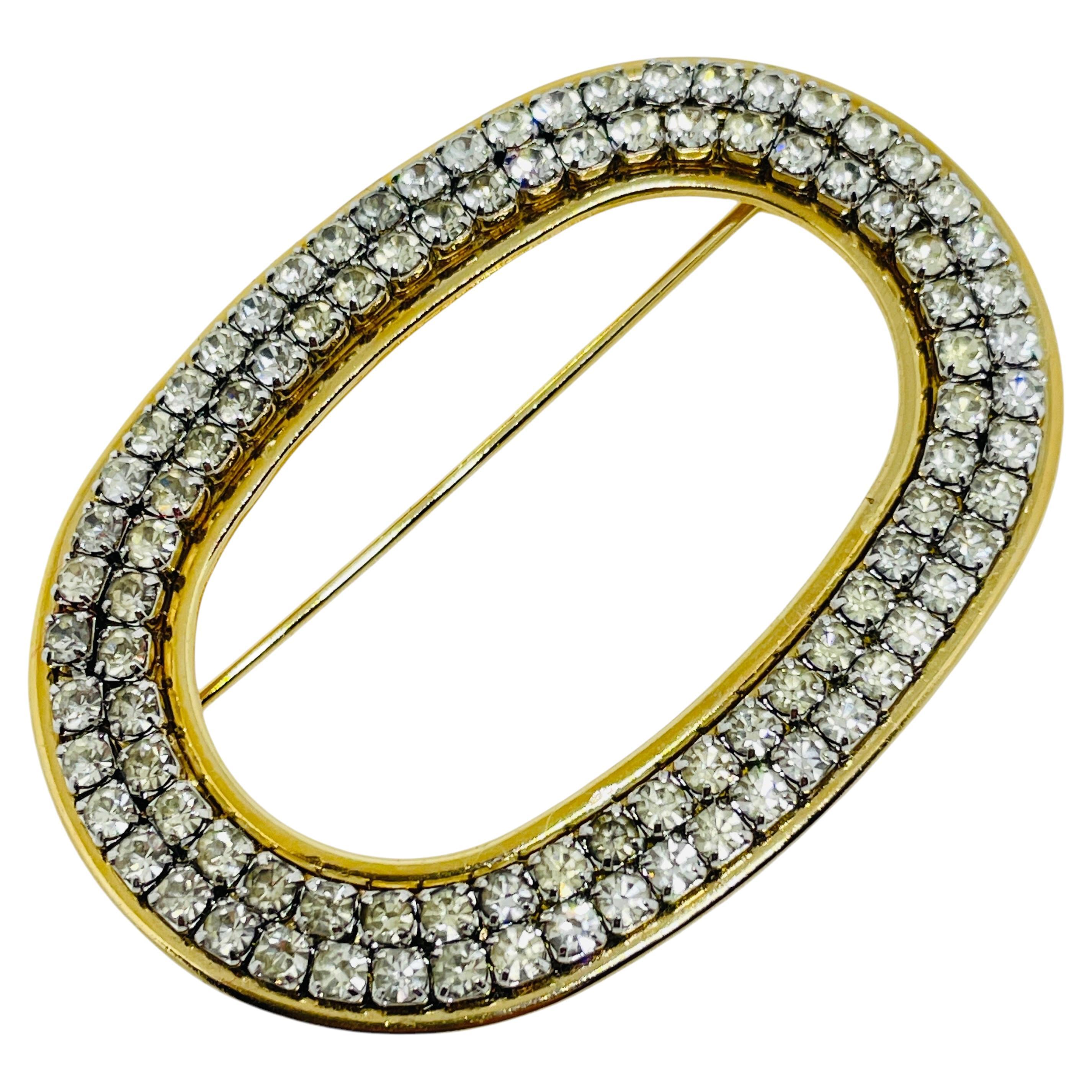 Vintage gold tone rhinestone designer brooch