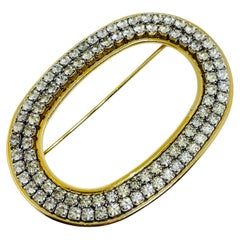 Vintage gold tone rhinestone designer brooch