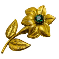 Vintage gold tone rhinestone flower designer brooch