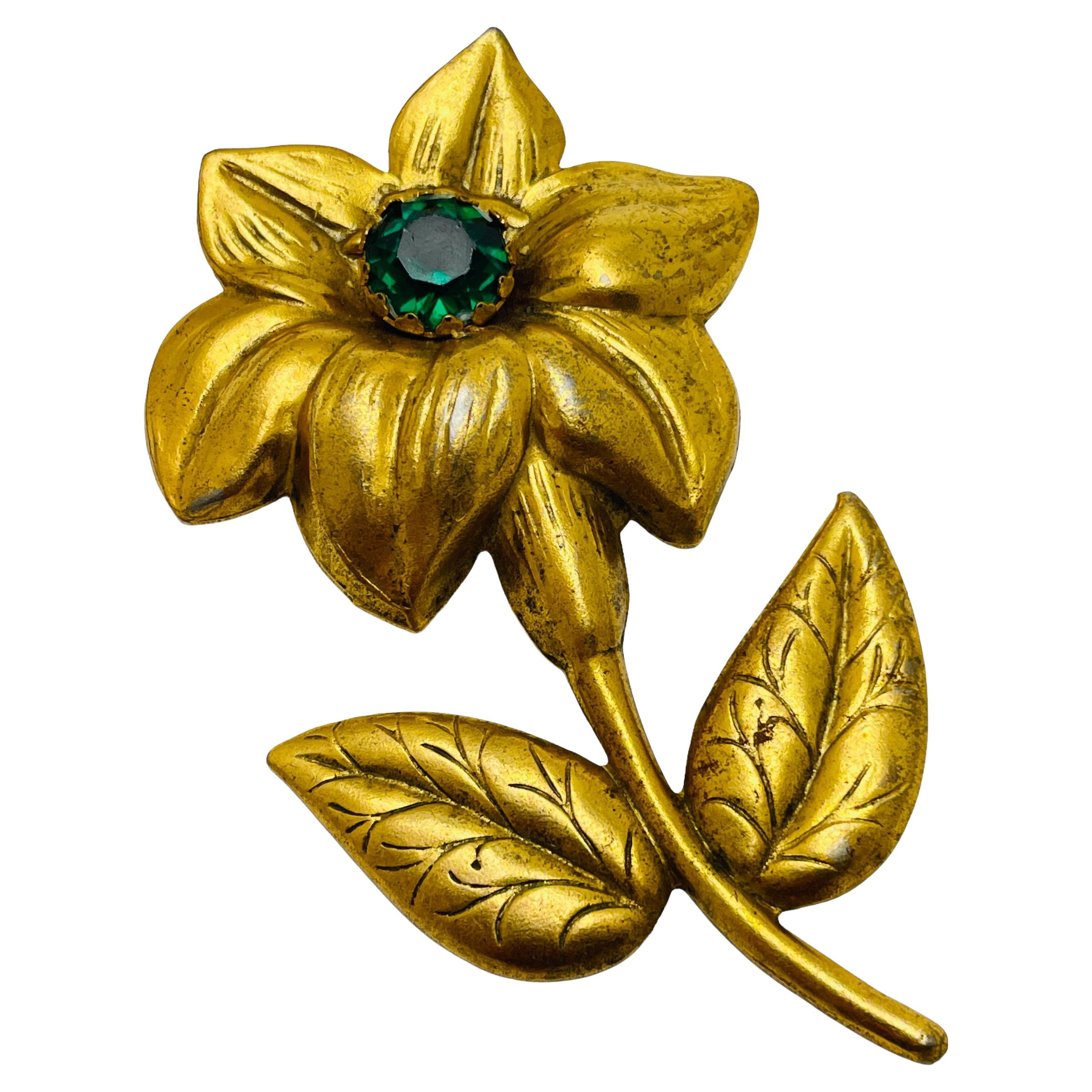 Vintage gold tone rhinestone flower designer brooch