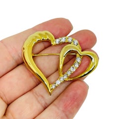 Vintage gold tone rhinestone heart designer brooch