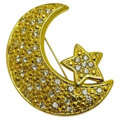 Vintage gold tone rhinestone moon star designer brooch