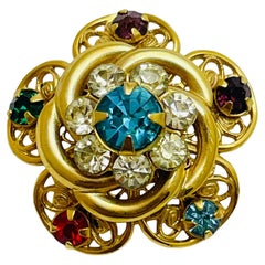 Vintage gold tone rhinestone small brooch
