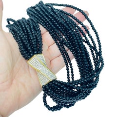 Vintage gold tone rhinestones black glass multi strand beaded choker necklace