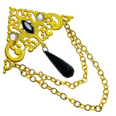Vintage gold tone rhinestones dangle designer brooch