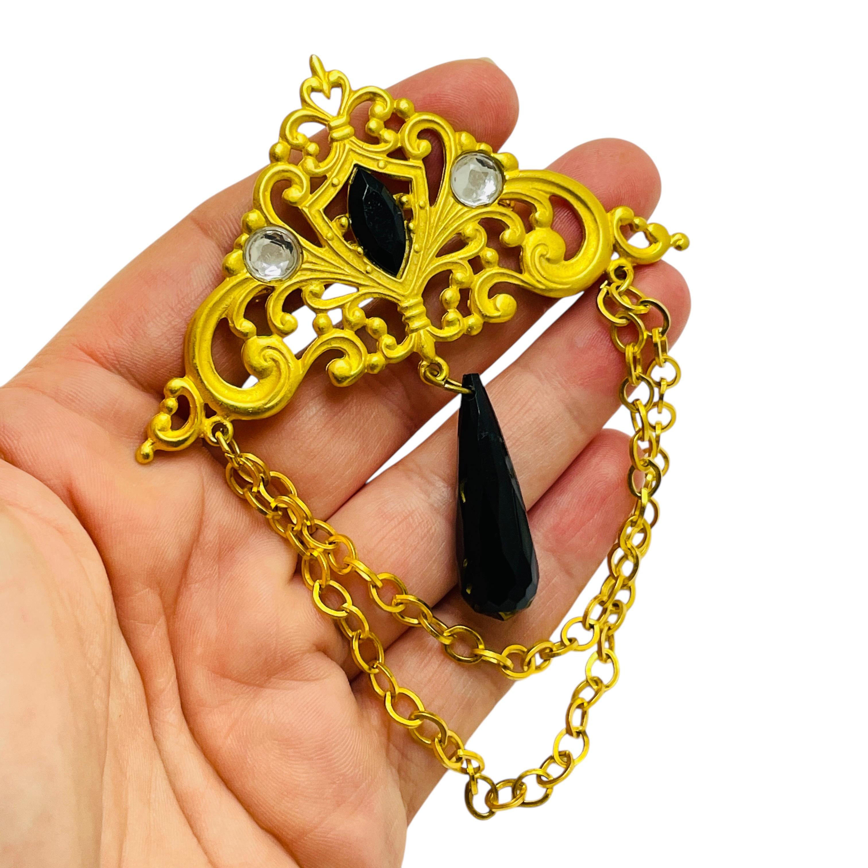 Women's Vintage gold tone rhinestones dangle designer brooch For Sale