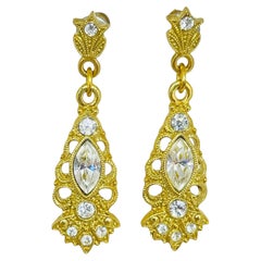 Vintage gold tone rhinestones dangle designer pierced earrings
