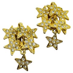 Vintage gold tone rhinestones dangle stars designer clip on earrings