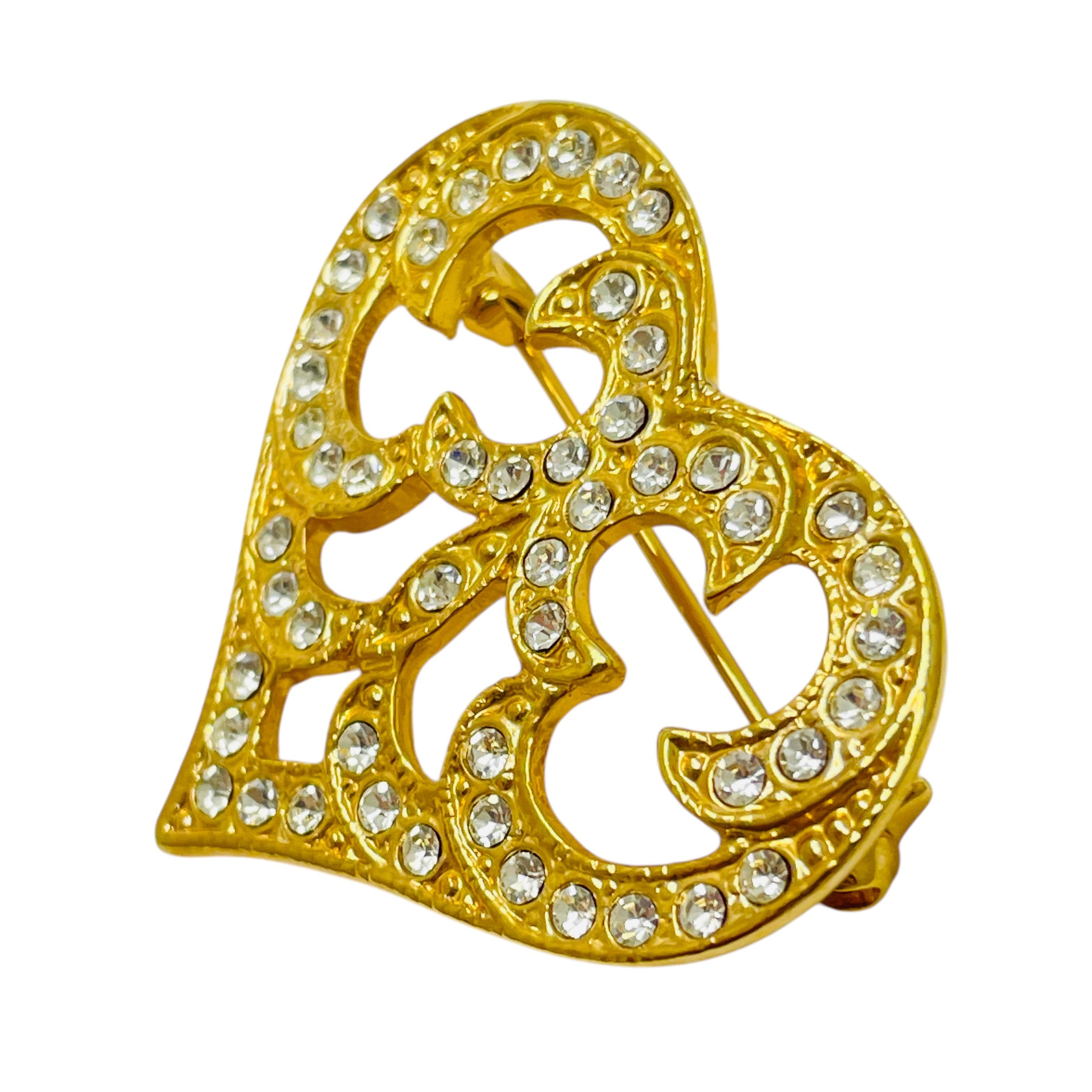 DETAILS

• unsigned 

• gold tone with rhinestones

• vintage designer brooch 

MEASUREMENTS  

• 

CONDITION

•  very good vintage condition with minimal signs of wear 

 Sku 49

❤️❤️  VINTAGE DESIGNER JEWELRY ❤️❤️

❤️❤️  ALEXANDER’S BOUTIQUE  ❤️❤️