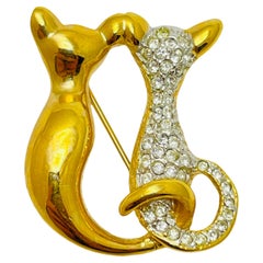Broche vintage en strass doré avec deux am designs