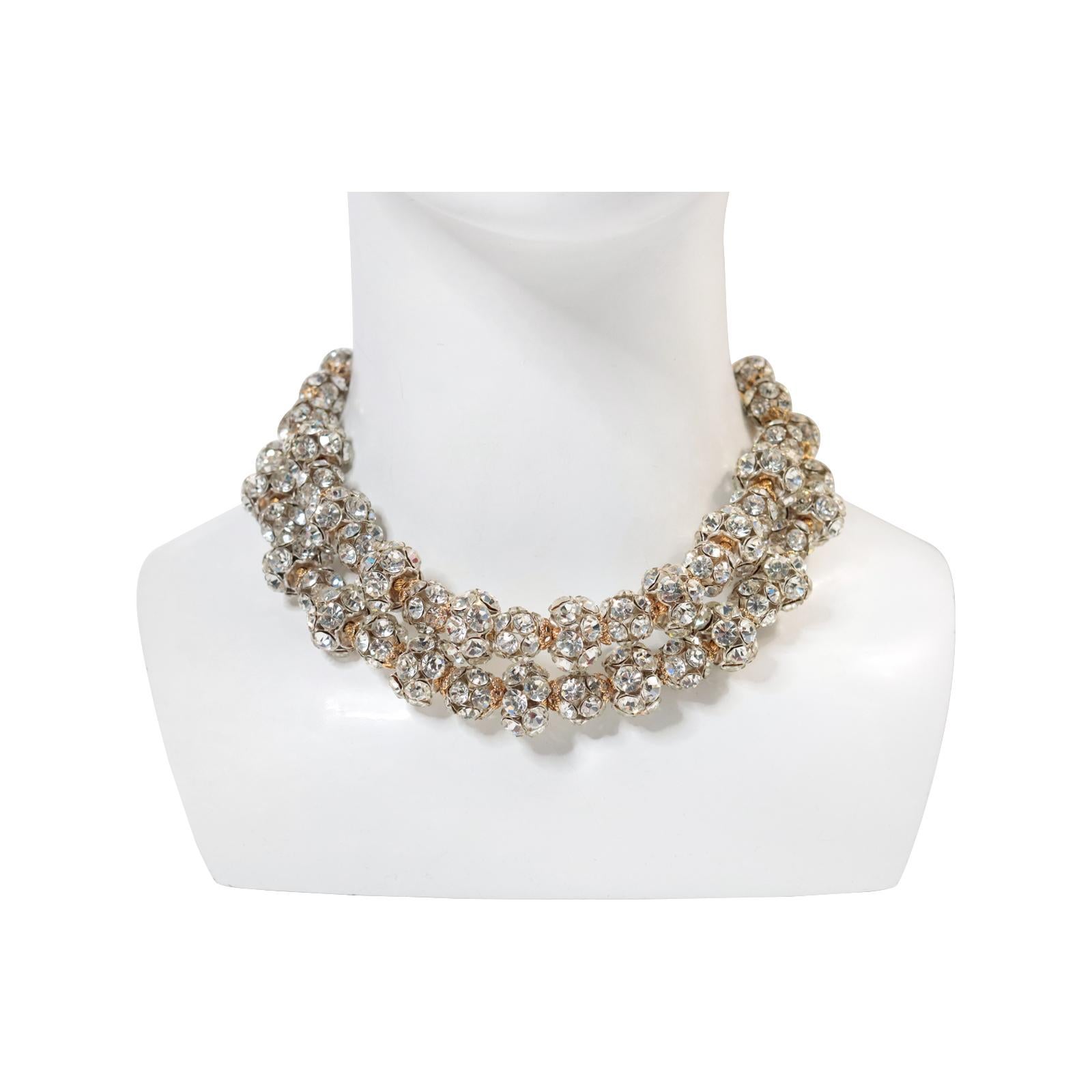 Vintage Gold Tone Rondelles Necklace Circa 1940s. This is one of the most unusual and well-made necklaces in the collection.  It is round in shape and comes in different sizes, separated by tiny gold hat-like structures and small beads.  It can be