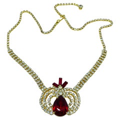 Vintage gold tone ruby red rhinestones designer necklace Vintage gold tone ruby red rhinestones designer necklace